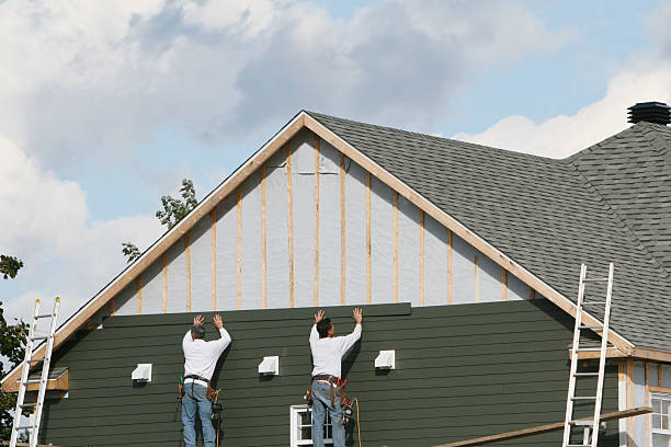 Professional Vinyl Siding technician working in Ellington, CT